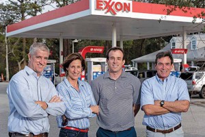 11/28/18 - Holt Oil Co. Inc. is a third-generation family-owned and operated business with offices in Wilmington and Fayetteville. The company services five counties in eastern North Carolina in wholesale and retail gas, food service and convenience stores. The business includes Holt Real Estate Inc., Holt Transport Inc., and Holt Cstore Inc. From left, Hannah Holt, William (Bill) Holt, Charles Cox and his father Louis Cox pose for a photograph outside of the Porterís Neck Country Store on Market Street in Wilmington, N.C. Photo by Michael Cline Spencer
